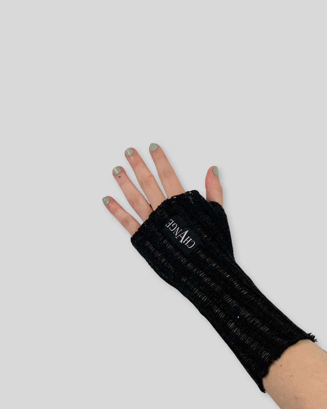 Handgestrickte Armstulpen